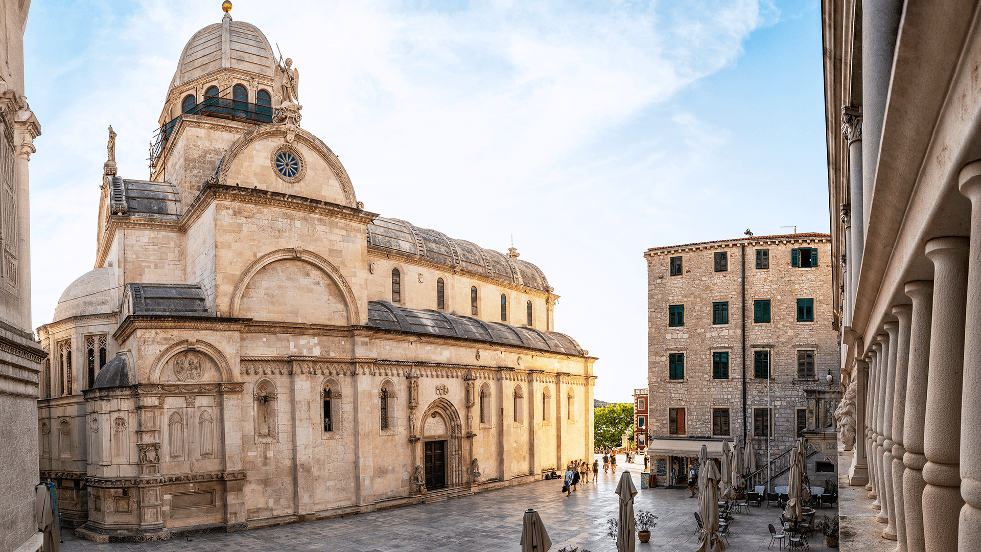 Stone cathedral and square in Šibenik with outdoor café