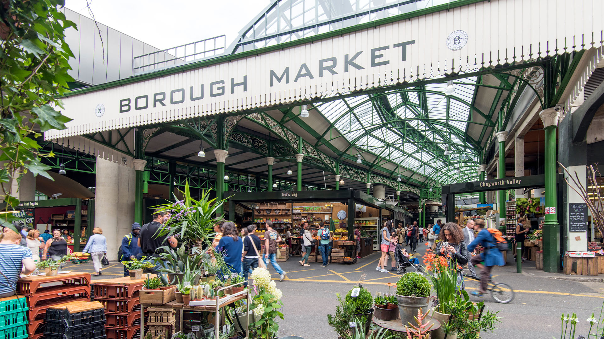 Borough Market entrance with shoppers in London