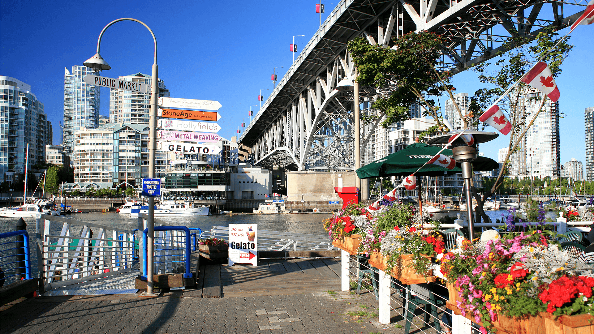 Outdoor flower shop and signs by Granville Bridge