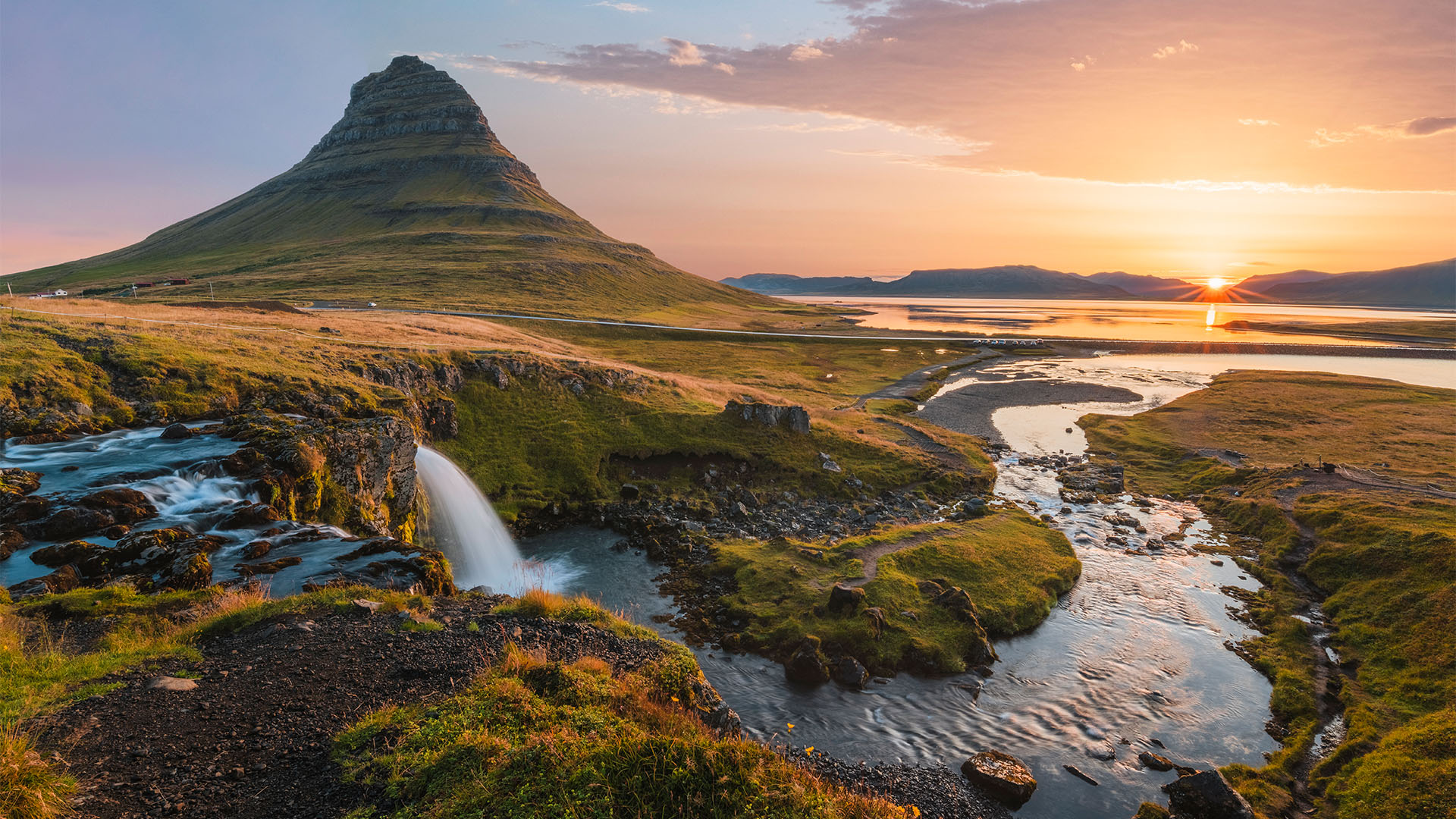 Waterfall at sunrise near Mount Kirkjufell
