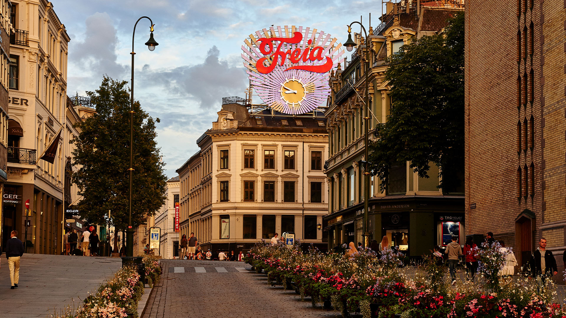 Oslo street with flowers and historic buildings