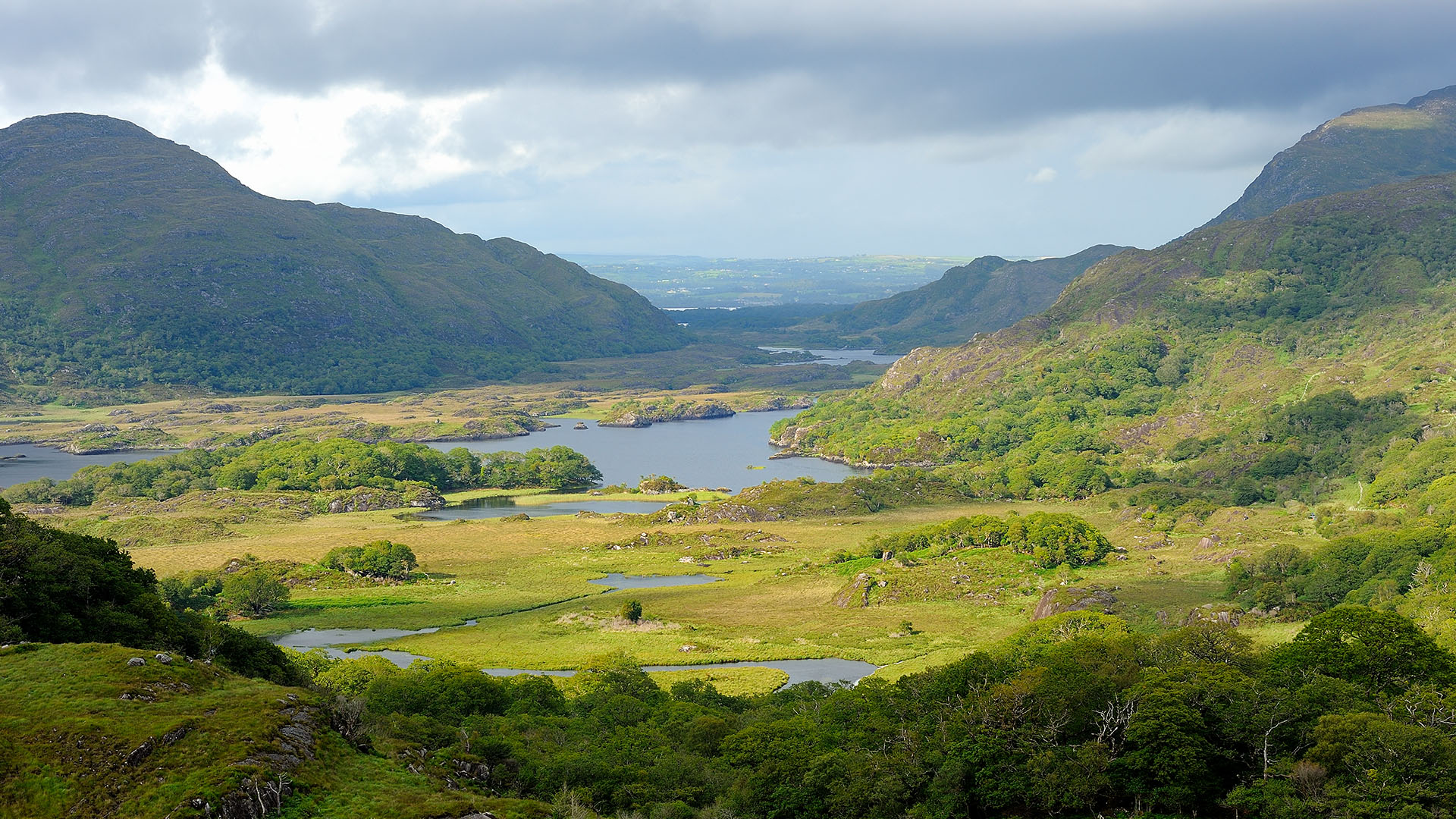 Big, green valley with lakes and river