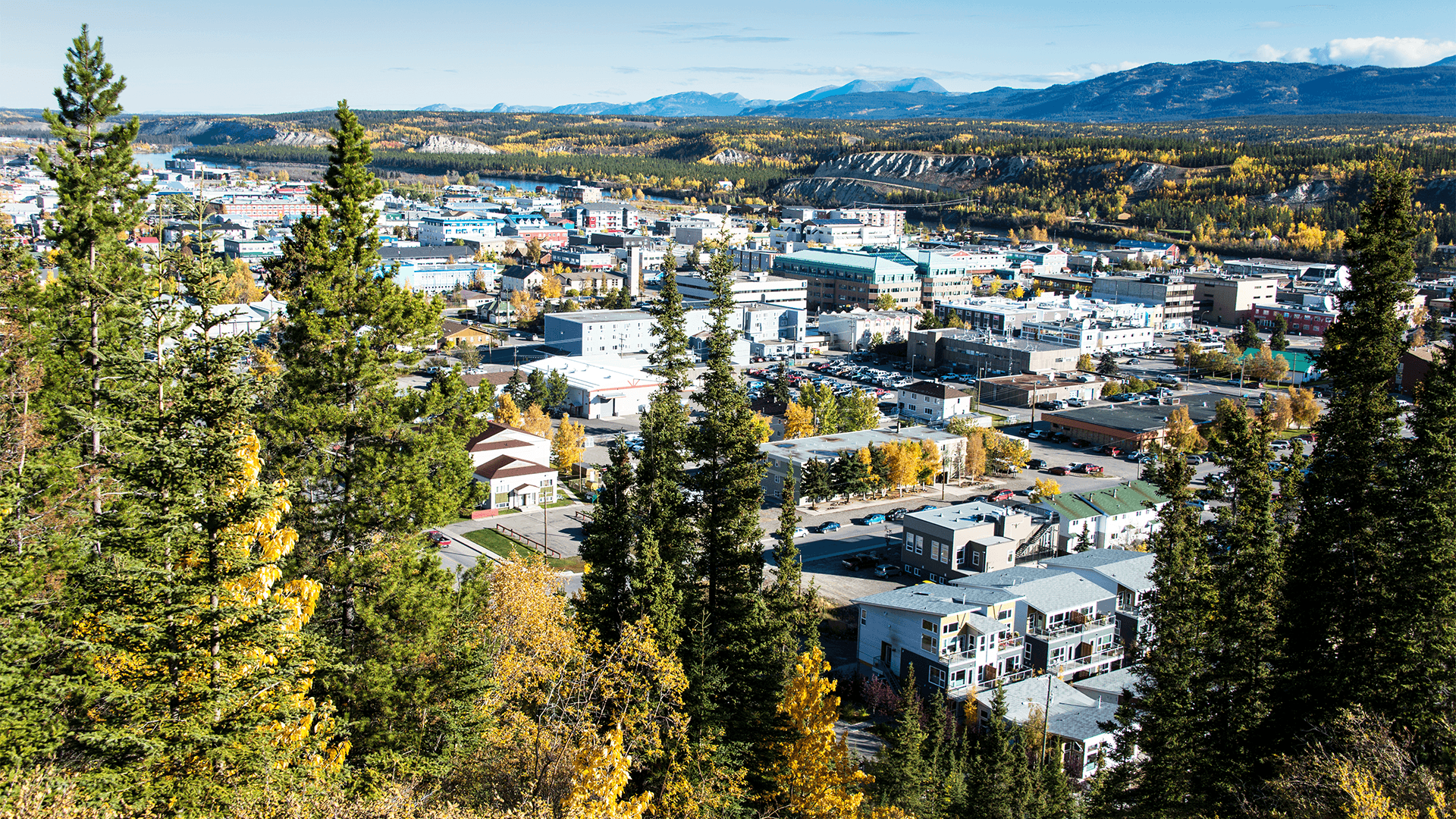 City of Whitehorse surrounded by mountains and forests
